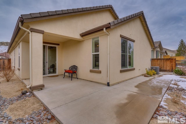 back of house featuring a patio area and central AC unit