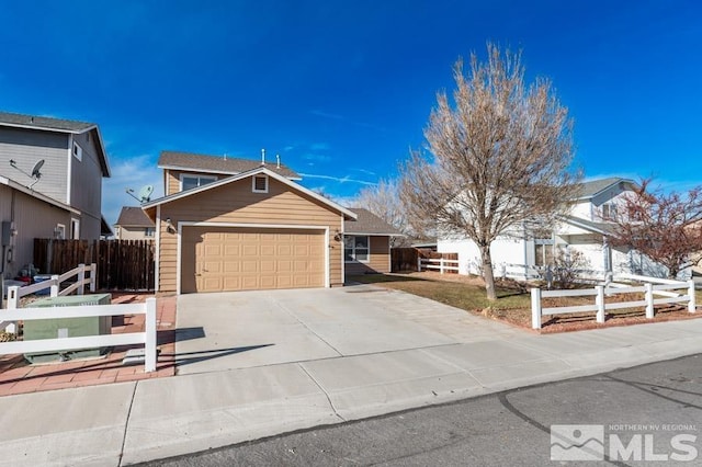 view of front of property featuring a garage