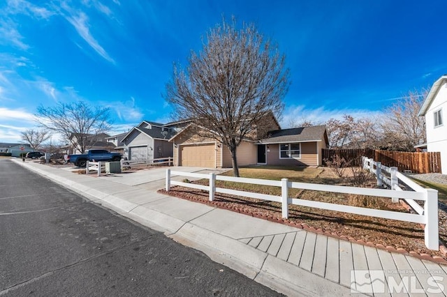 ranch-style home with a garage