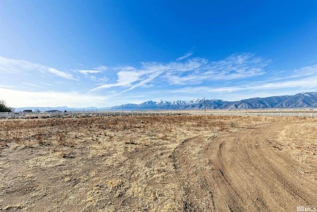 property view of mountains featuring a rural view