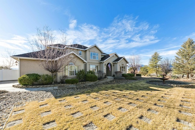 view of front of house with a front lawn