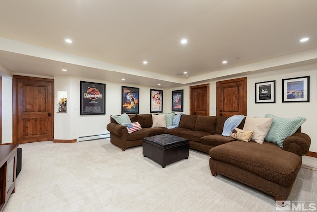 carpeted living room with baseboard heating