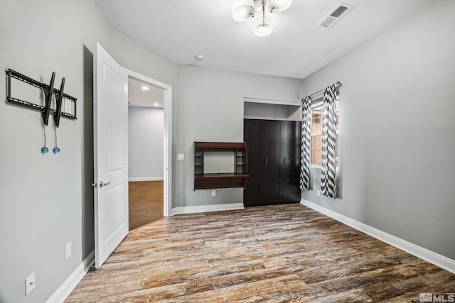 interior space with hardwood / wood-style flooring