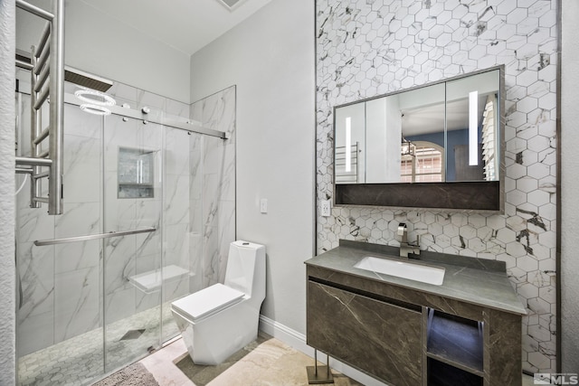 bathroom with vanity, an inviting chandelier, toilet, and a shower with door