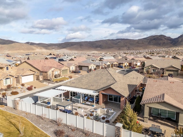 bird's eye view with a mountain view