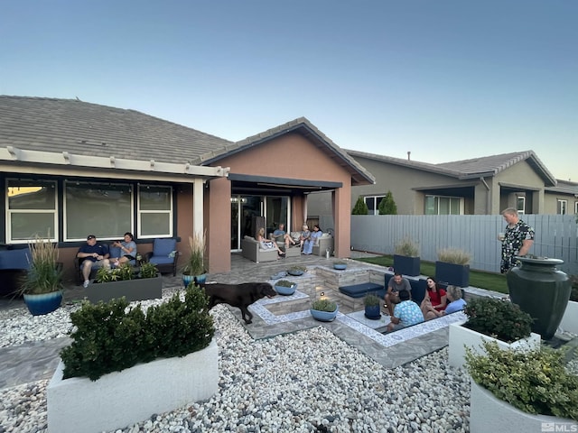 back of house featuring a patio area