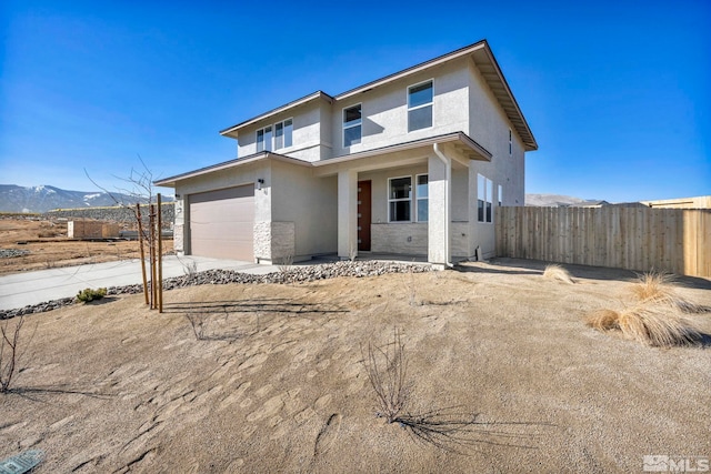 view of front of home with a mountain view