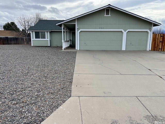 ranch-style home with a garage