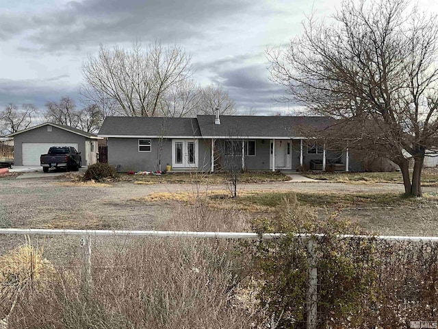 ranch-style home with a garage