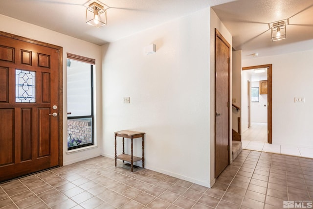 view of tiled foyer