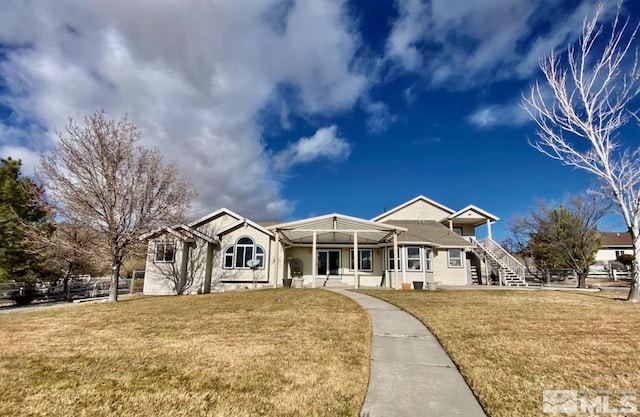 ranch-style house with a front lawn