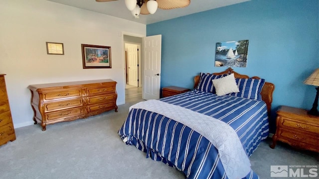 bedroom featuring ceiling fan and light colored carpet