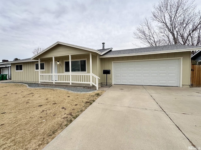 ranch-style home with a porch and a garage