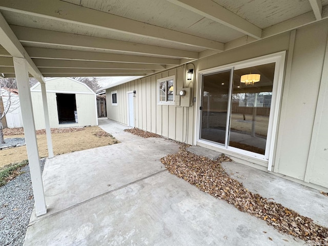 view of patio / terrace with a shed