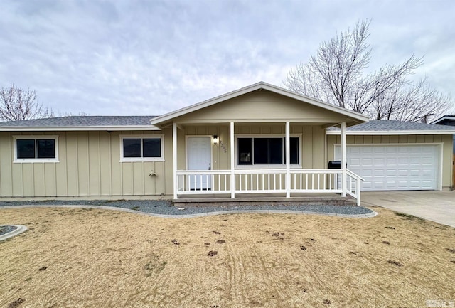 ranch-style house with a porch and a garage