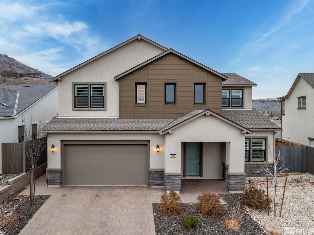 view of front of property with a garage