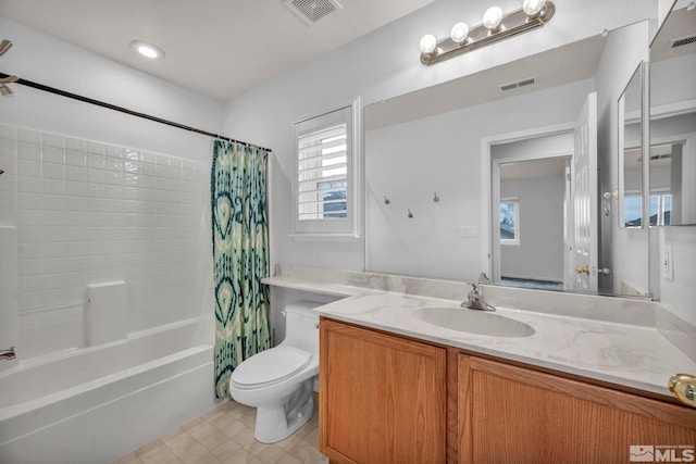 full bathroom with shower / bath combo, toilet, and vanity