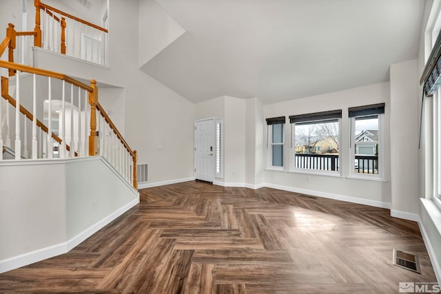 entrance foyer with dark parquet flooring