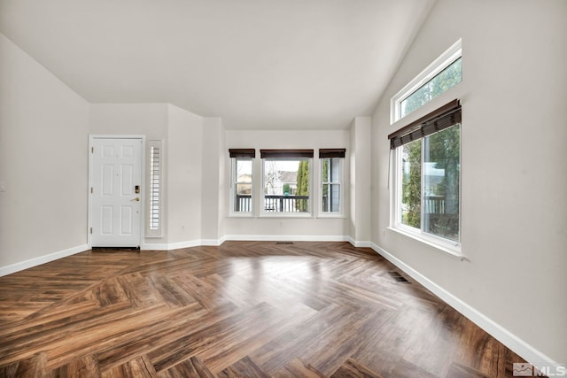 interior space featuring parquet flooring