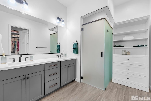 bathroom featuring vanity and walk in shower