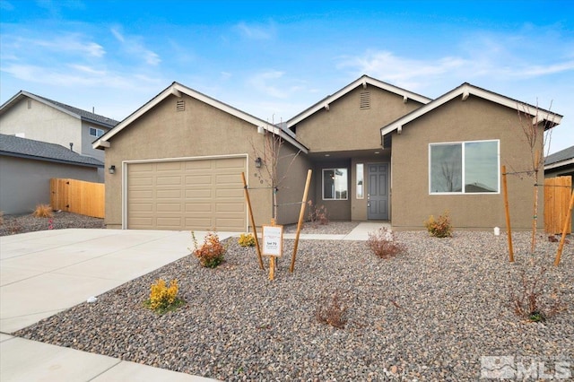 single story home with a garage