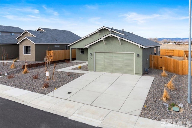 single story home featuring a garage