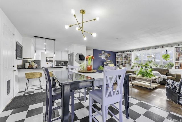 dining area featuring an inviting chandelier