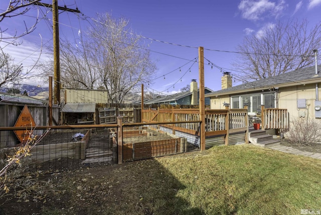 view of yard with a deck