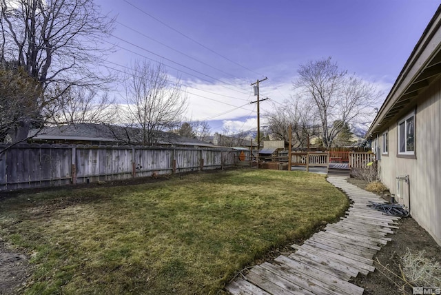 view of yard featuring a wooden deck