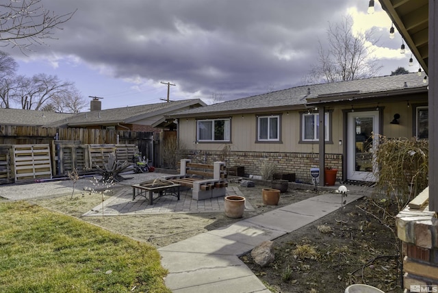 view of patio featuring an outdoor fire pit