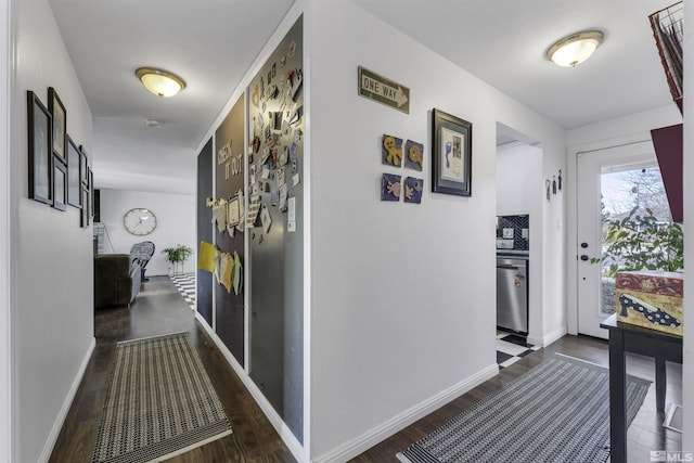 corridor featuring dark hardwood / wood-style floors