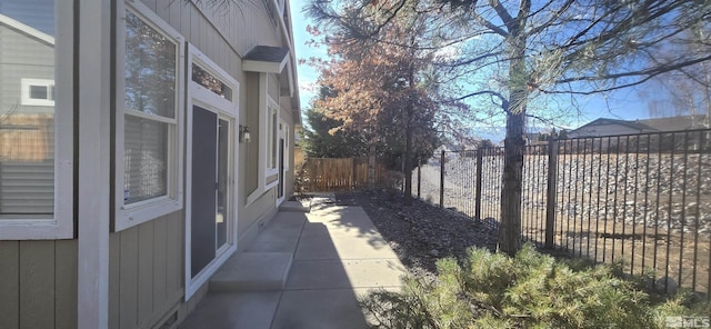 view of property exterior featuring a patio area