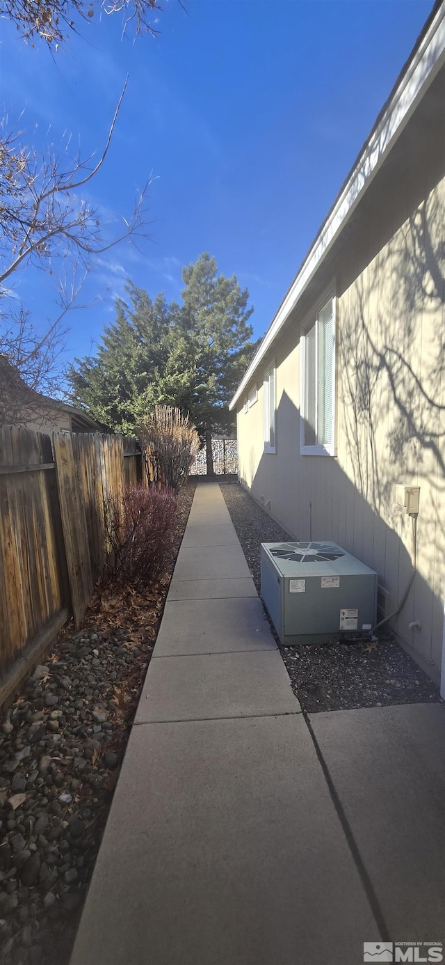 view of home's exterior featuring central air condition unit