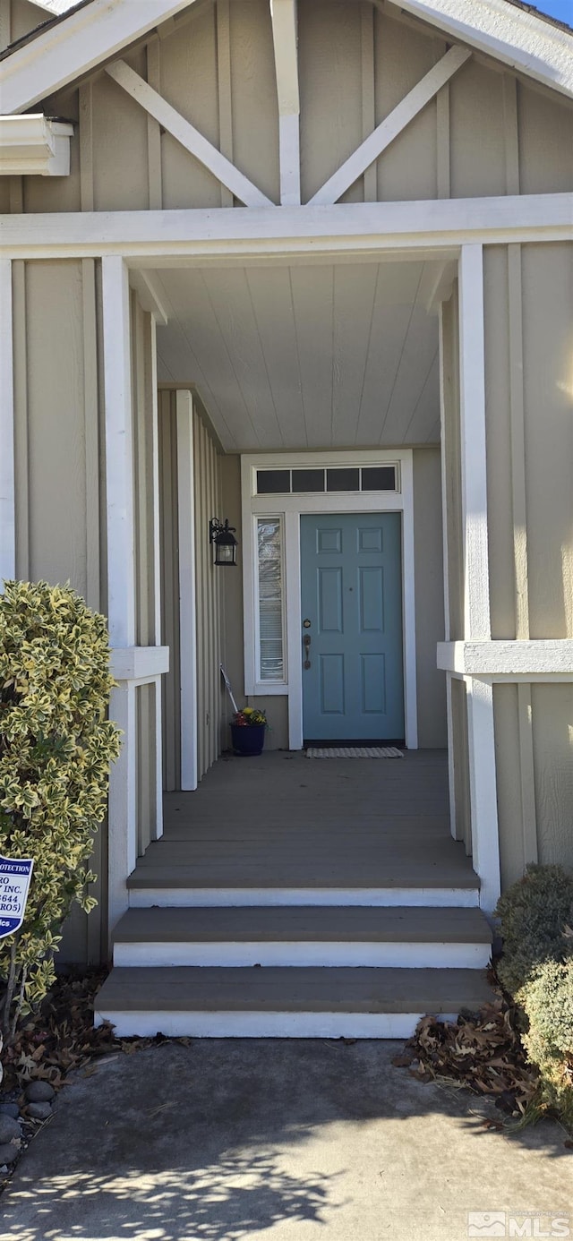 doorway to property featuring a porch