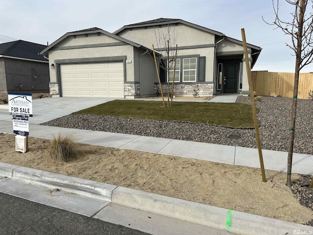 ranch-style house featuring a garage