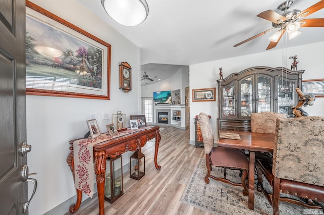 dining space with light hardwood / wood-style flooring