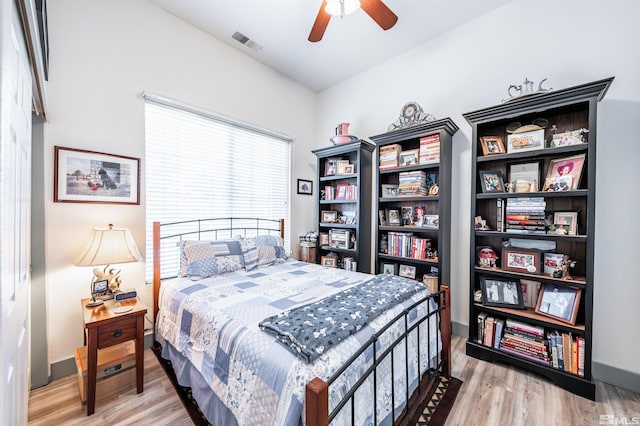 bedroom featuring ceiling fan and light hardwood / wood-style floors