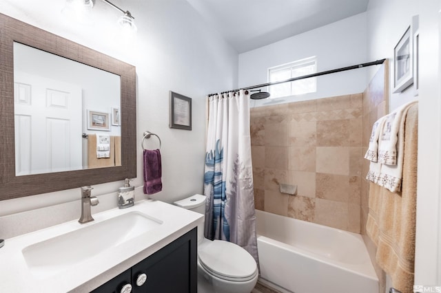 full bathroom featuring vanity, toilet, and shower / bath combo with shower curtain