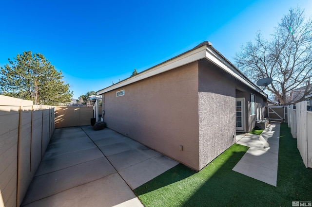 view of home's exterior featuring a patio