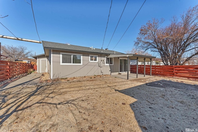 back of house with a patio area