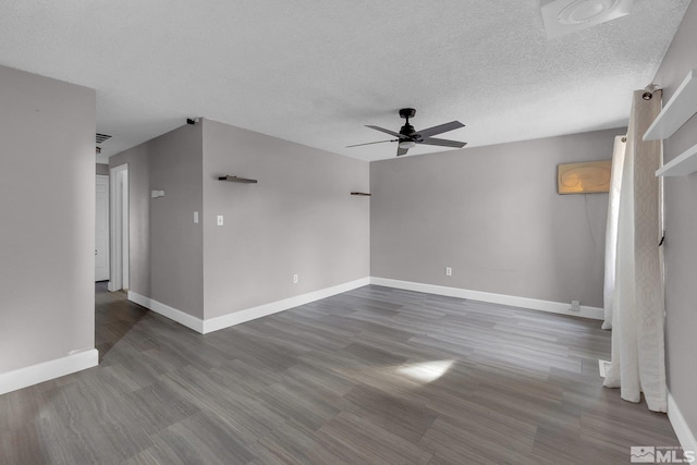 empty room featuring ceiling fan and wood-type flooring