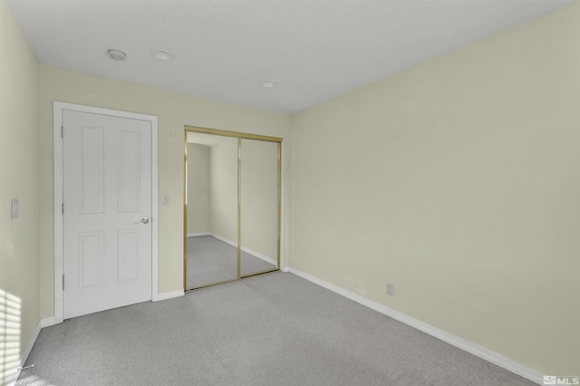 unfurnished bedroom featuring a closet