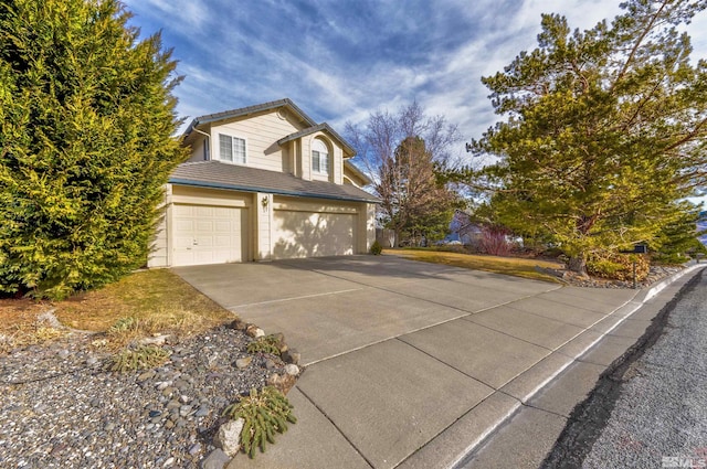 view of front of home with a garage