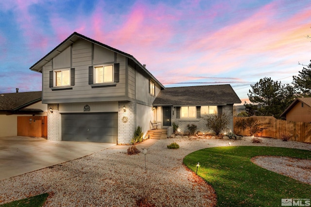 view of front of property with a garage