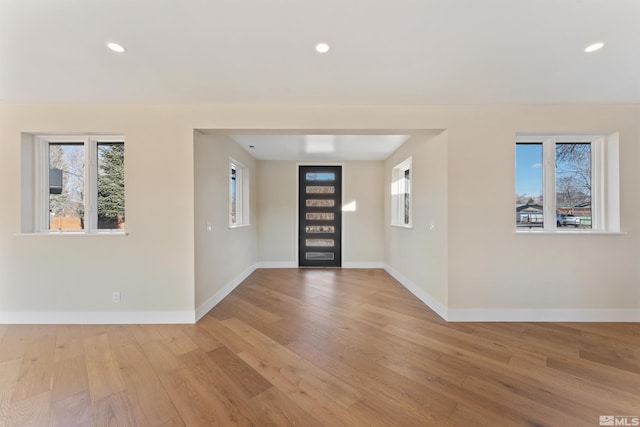 foyer with light hardwood / wood-style floors