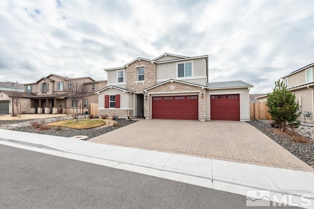 view of front of home with a garage