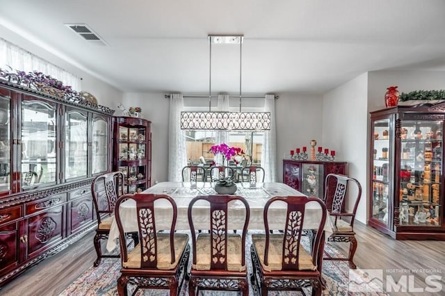 dining area featuring light hardwood / wood-style floors