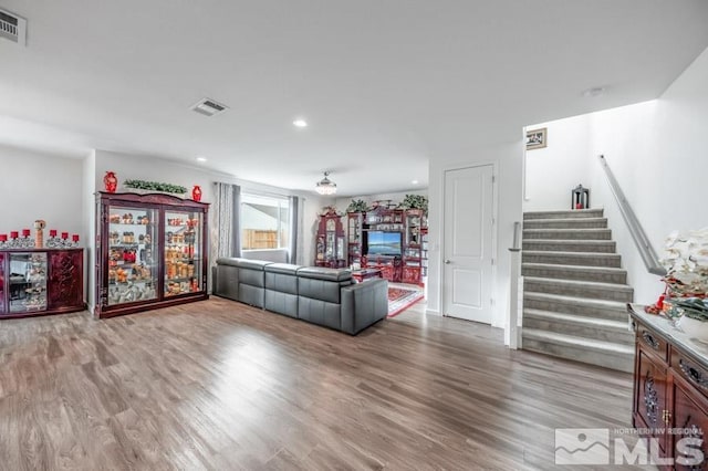 living room with wood-type flooring