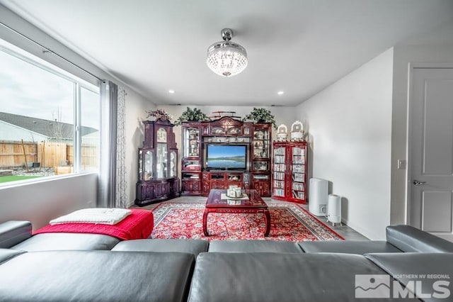 living room with a chandelier