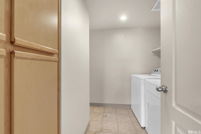 laundry area featuring washing machine and dryer